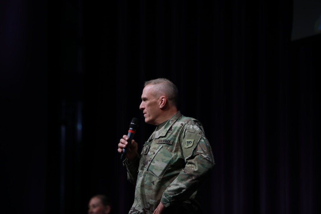 State Command Sergeant Major, Command Sgt. Maj. Curtis Patrouille, speaks during the opening remarks of the Wisconsin Army National Guard's first ever Women's Symposium, March 29, 2024. The events focus was on reinforcing the organization's commitment to gender equality and empowering leaders, women, and allies to advocate for one another. (U.S. National Guard photo by Staff Sgt. Amber Peck)