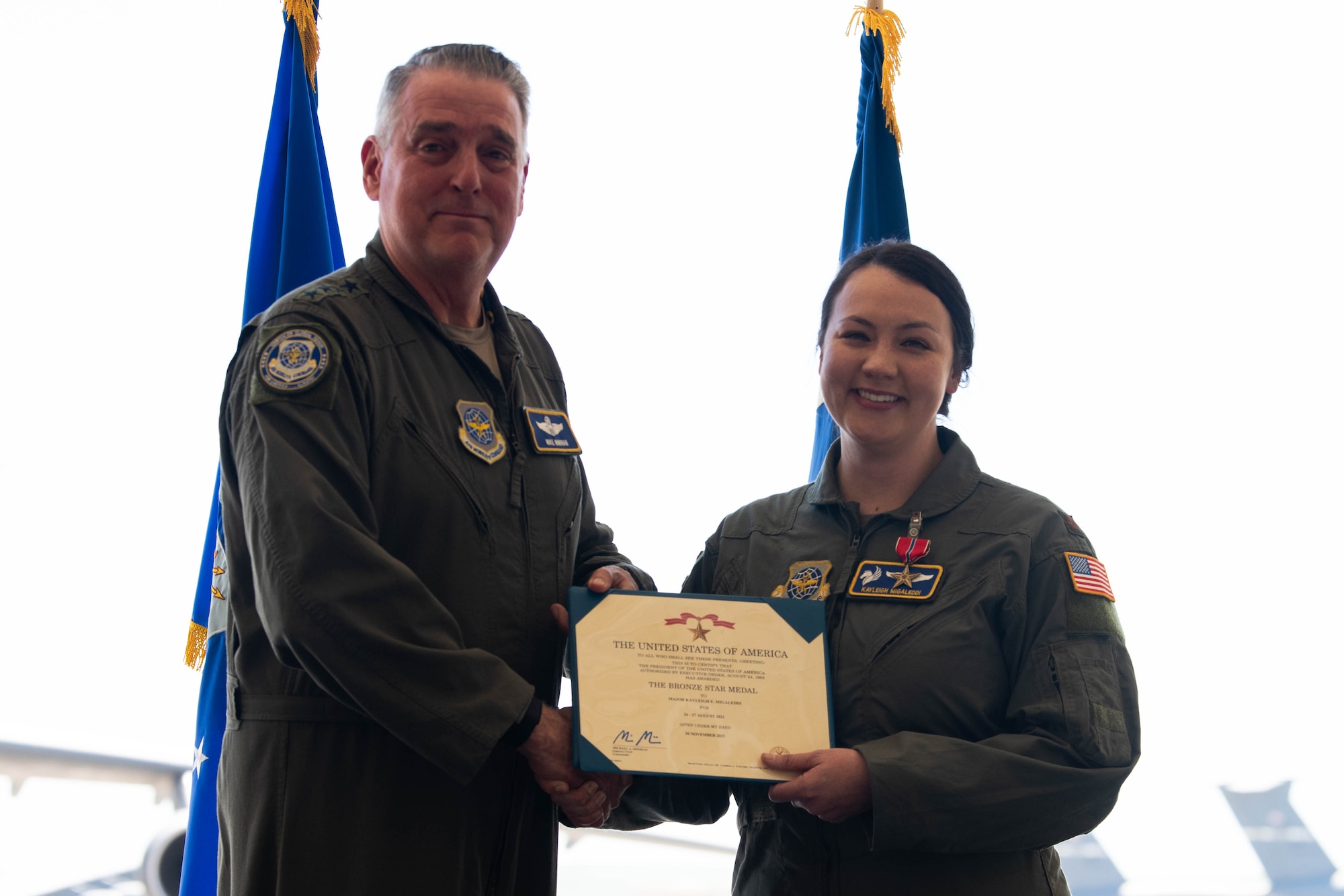 General awards a medal to an Airman