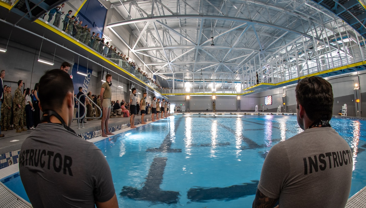 Instructors from the Air Force’s Special Warfare Training Wing act as safety spotters during a demonstration following a ceremony dedicating the Maltz Special Warfare Aquatic Training Center, located on Joint Base San Antonio-Chapman Training Annex