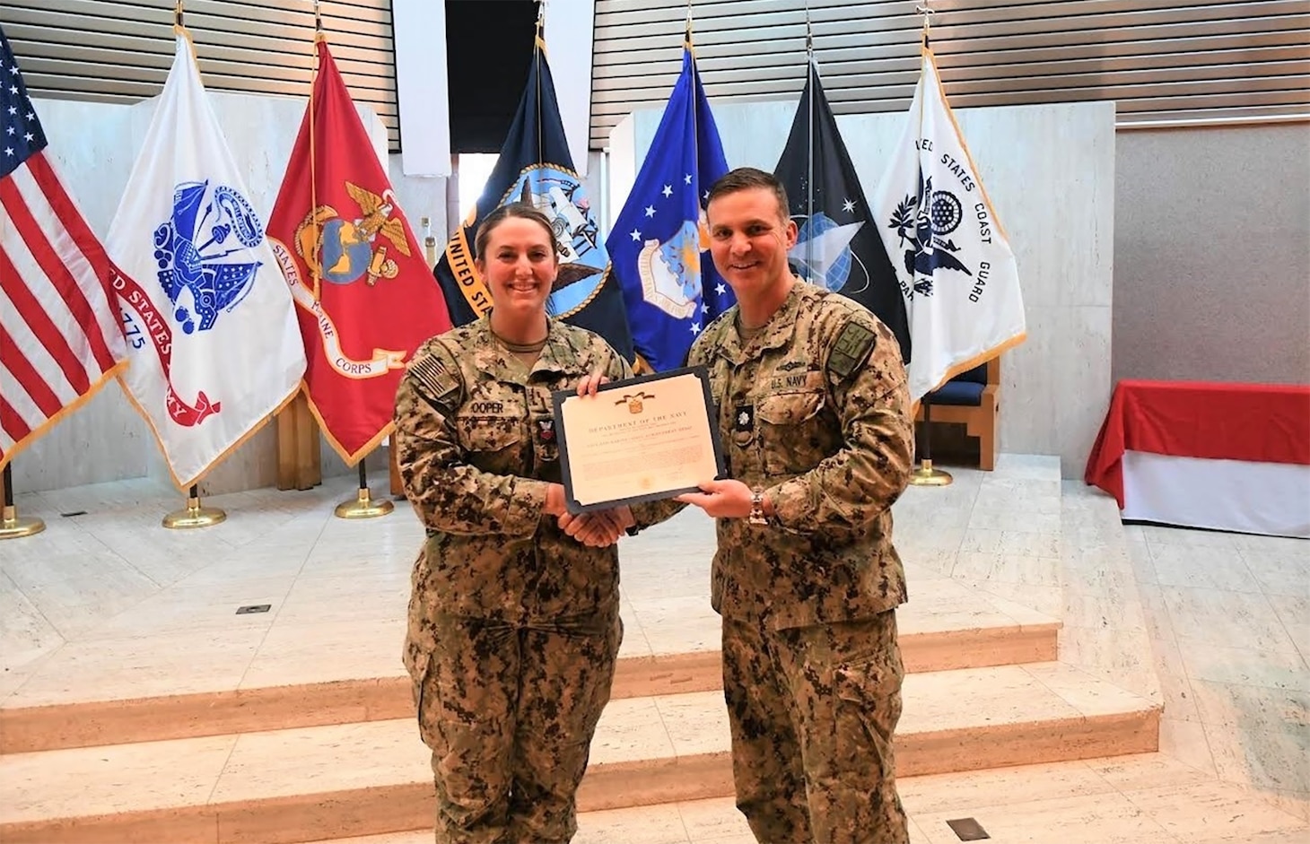 During an awards ceremony, Cryptologic Technician Collection (CTR) 1st Class Emily L. Hooper was recognized by Cmdr. Peter B. Manzoli, commanding officer, Information Warfare Training Command (IWTC) Corry Station, as the 2023 IWTC Corry Station Instructor of the Year at the Corry Station Chapel, Feb. 20, 2024.