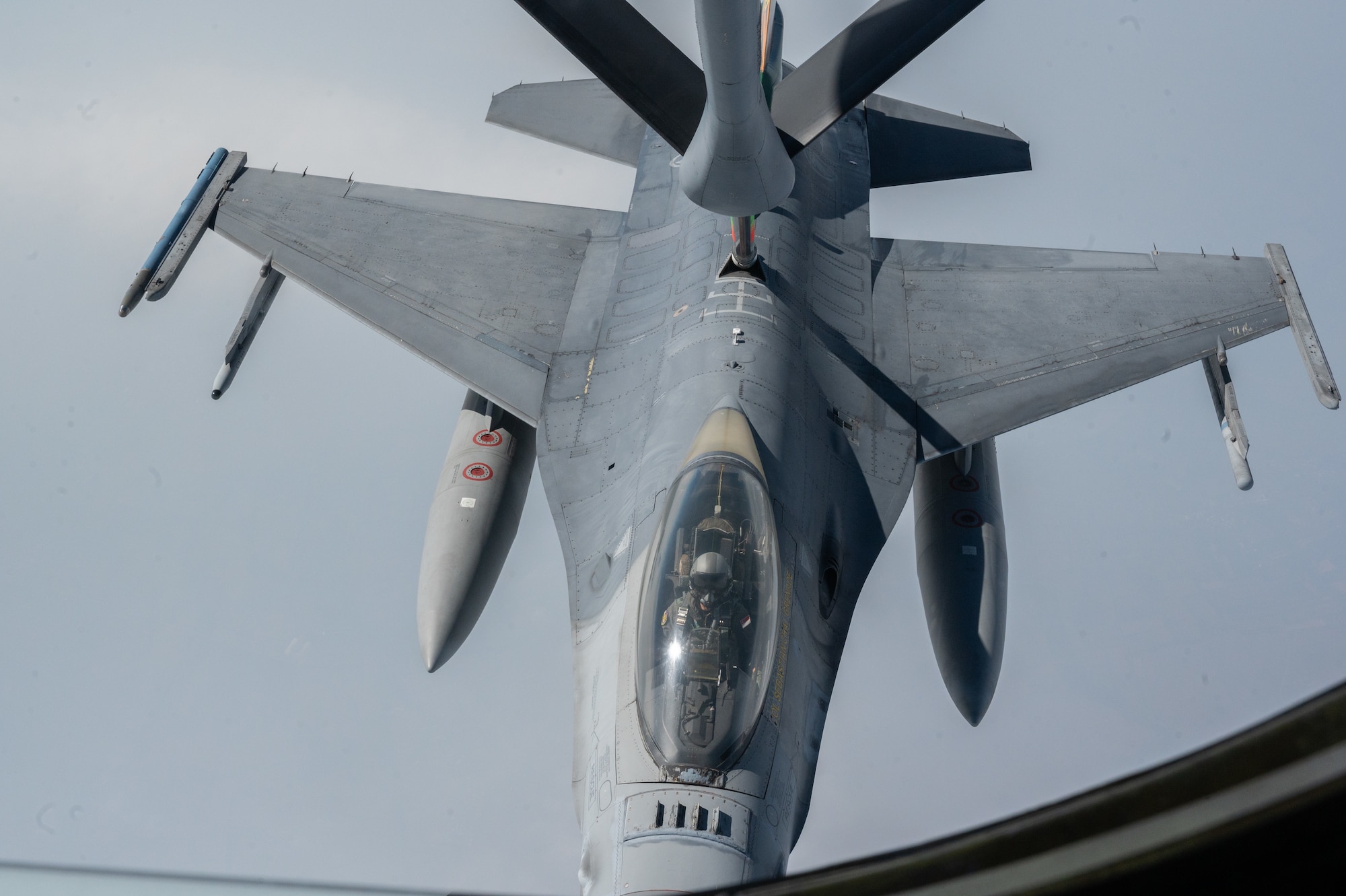A Republic of Singapore Air Force F-16 gets refueled by a Washington Air National Guard KC-135 Stratotanker during Cope Tiger 2024, Korat Royal Thai Air Base, Thailand, March 26, 2024. Cope Tiger builds relationships and promotes our capacity for security and interoperability by demonstrating our regional commitment. (U.S. Air Force photo by Tech. Sgt. Hailey Haux)