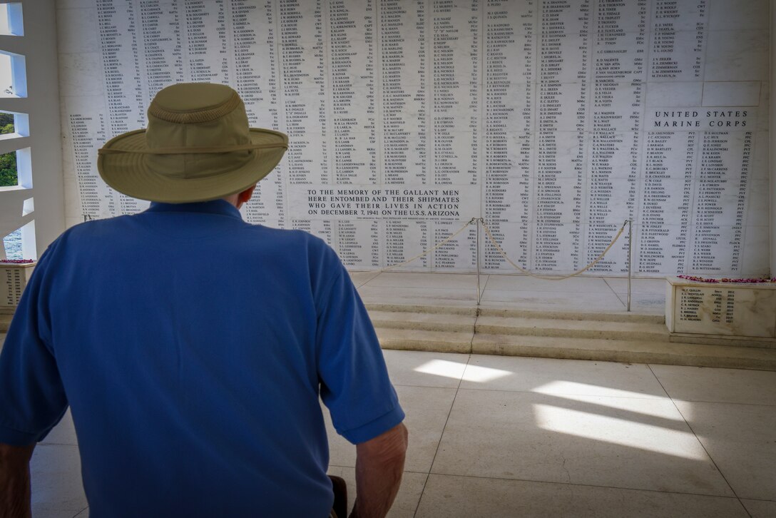 Dr. Stanley Allen, a U.S. Army WWII veteran, observes the Shrine Room Wall of the USS Arizona at the Pearl Harbor National Memorial (U.S. National Park Service) in Honolulu, Hawaii, March 19, 2024.