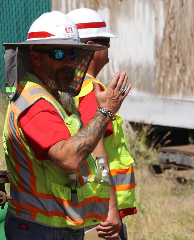 U.S. Army Corps of Engineers Quality Assurance Supervisor Scott Sornson and Ben Ashlock, USACE quality assurance representative oversee Phase 2 commercial property debris removal operations March 22, 2024, in Lahaina, Hawaii. This was the first commercial property debris removal operation for commercial property impacted by the Aug. 8, 2023, wildfires. (USACE photo by Stacey Reese)l