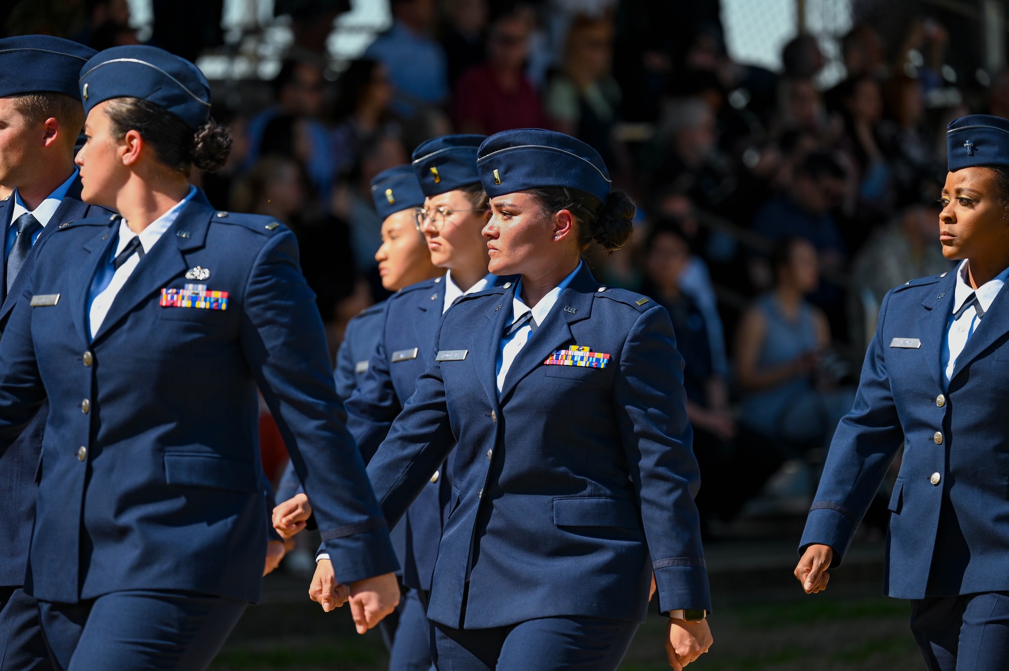 U.S. Air Force 2nd Lt. Ericka Woolever, Air Force Officer Training School trainee, marches in the pass and review portion of the graduation parade for OTS at Maxwell Air Force Base, AL, March 29, 2024. Woolever is the first member from the 350th SWW to attend OTS. (U.S. Air Force photo by Capt. Benjamin Aronson)