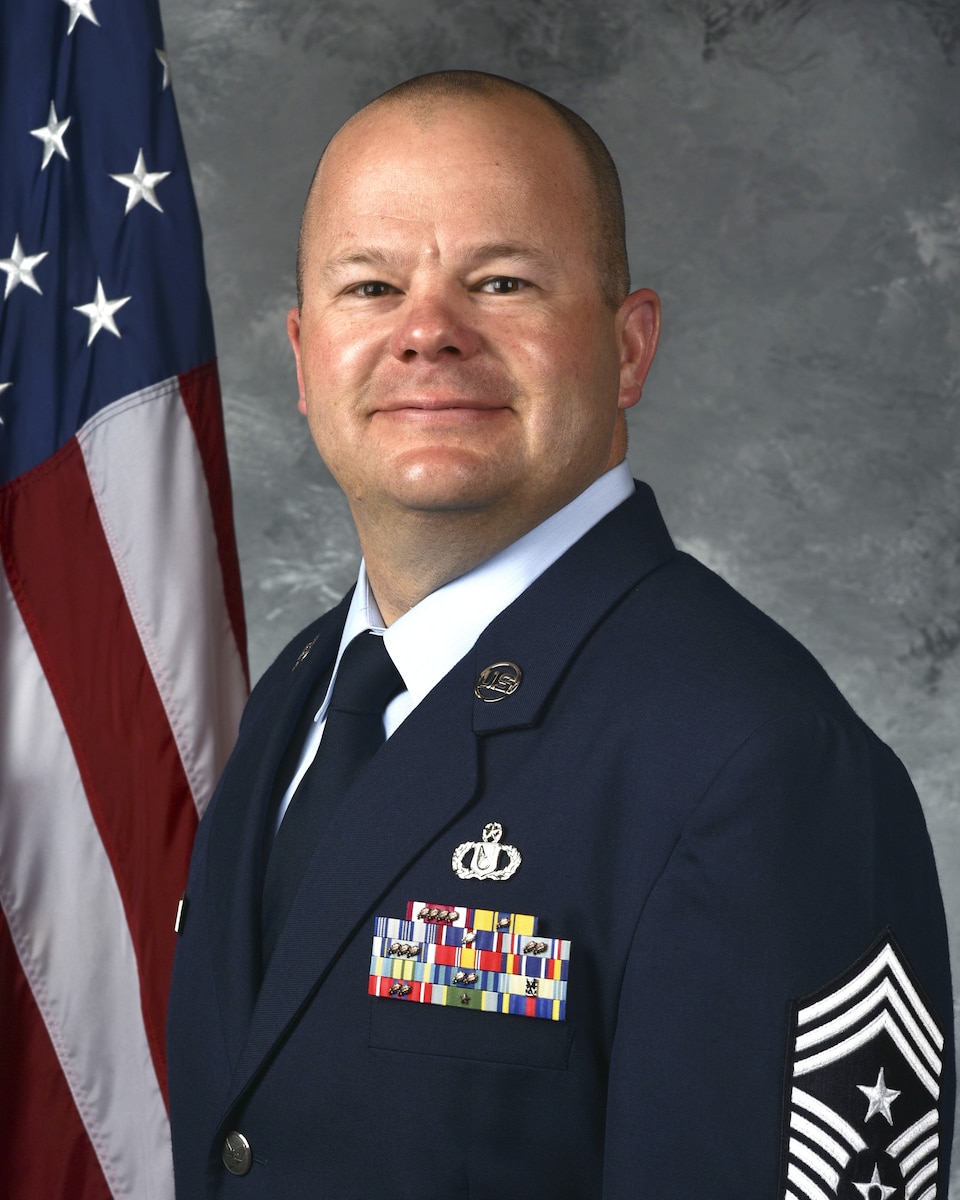 An official military portrait of Chief Master Sgt. Paul Miller, 926th Wing command chief