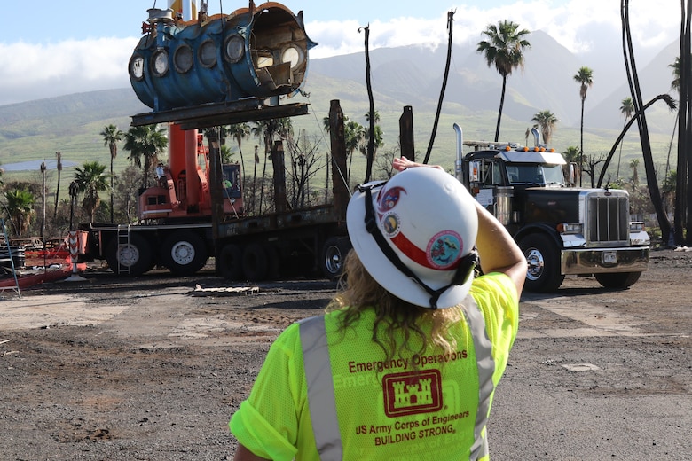 U.S. Army Corps of Engineers contractors remove a submarine during vessel debris removal operations near the harbor in Lahaina, Hawai‘i, Feb. 18, 2024. The submarine was one of the fleet of commercial tourist submarines for citizens and tourists to view marine life around Maui. To ensure debris removal operations are conducted safely, there is significant coordination and safety planning between USACE and the contractor performing the work. USACE is overseeing the debris removal mission under a FEMA Federal Emergency Management Agency mission assignment, which is part of a coordinated effort with the Hawaii Emergency Management Agency, the County of Maui  and the U.S. Environmental Protection Agency to clean up areas of the island affected by the Aug. 8, 2023, wildfires. (USACE Photo by Robert DeDeaux)