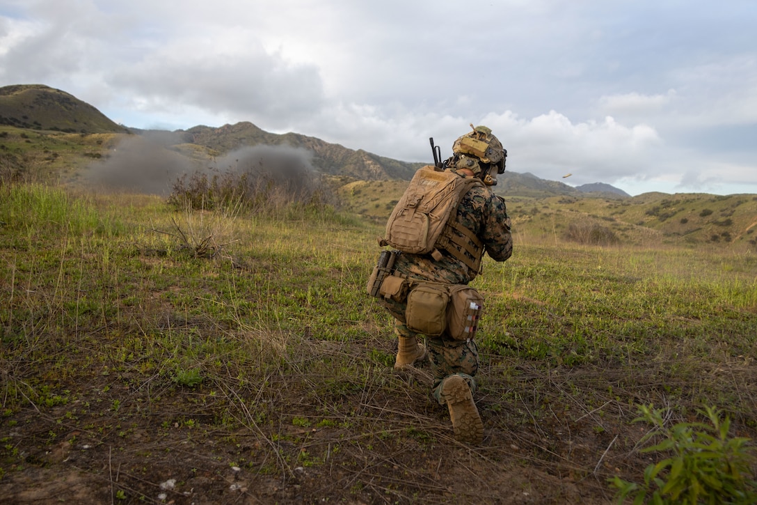 U.S. Marine Corps Sgt. Justin Chavez, a squad leader with 2nd Battalion, 1st Marine Regiment, 1st Marine Division, provides suppression during the division’s annual squad competition at Marine Corps Base Camp Pendleton, California, March 25, 2024. The week-long competition incorporates a variety of combat-related tasks designed to evaluate each squad’s proficiency. Chavez is a native of Alabama. (U.S. Marine Corps photo by Lance Cpl. Ballin)