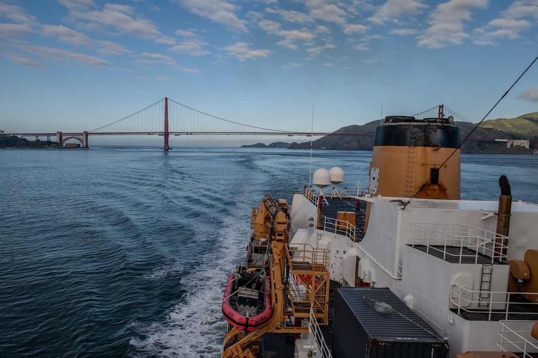 The U.S. Coast Guard Cutter Polar Star (WAGB 10) sails under San Francisco's Golden Gate Bridge after its 138-day deployment to Antarctica for Operation Deep Freeze 2024, March 31, 2024. The cutter will soon enter a Northern California drydock for phase four of its five-year service life extension program to prepare the cutter for the following year's Operation Deep Freeze, which is the annual logistical support mission provided by the Department of Defense to the National Science Foundation, managed by the U.S. Antarctic Program. (U.S. Coast Guard photo by Petty Officer 2nd Class Ryan Graves)