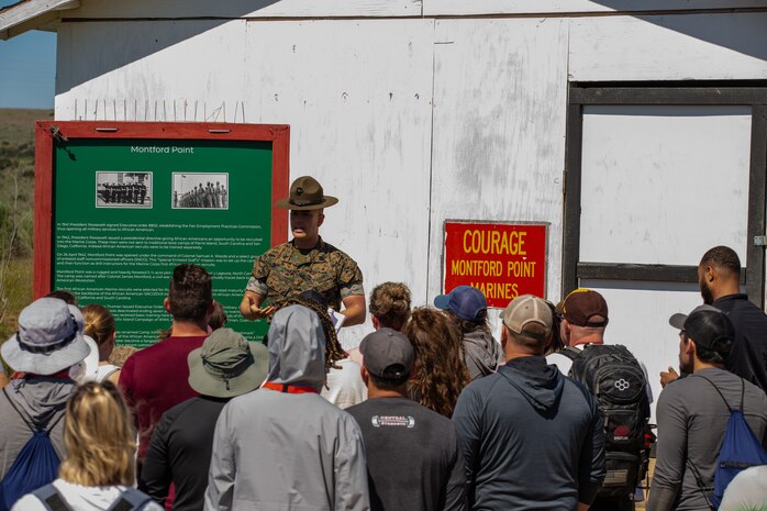 U.S. Marine Corps Staff Sgt. Gustavo Felixgomez, a senior drill instructor with India Company, 3rd Recruit Training Battalion, gives a brief class on the Marines of Montford Point to educators from Recruiting Stations’ Albuquerque, Denver, Houston, and Salt Lake City as part of the 2024 Educator’s Workshop, April 3, 2024 at Marine Corps Recruit Depot San Diego, California. Participants of the workshop visit MCRD San Diego to observe recruit training and gain a better understanding about the transformation from recruits to United States Marines. Educators also received classes and briefs on the benefits that are provided to service members serving in the United States armed services. (U.S. Marine Corps photo by Sgt. Trey Q. Michael)