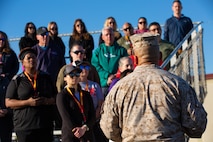 U.S. Marine Corps First Sgt. Mike Gonzalez Jr., the first sergeant of Alpha Company, 1st Recruit Training Battalion, gives educators with Recruiting Stations’ Albuquerque, Denver, Houston, and Salt Lake City a brief on the importance of the eagle, globe and anchor ceremony as part of the 2024 Educator’s Workshop, April 3, 2024 at Marine Corps Recruit Depot San Diego, California. Participants of the workshop visit MCRD San Diego to observe recruit training and gain a better understanding about the transformation from recruits to United States Marines. Educators also received classes and briefs on the benefits that are provided to service members serving in the United States armed services. (U.S. Marine Corps photo by Sgt. Trey Q. Michael)