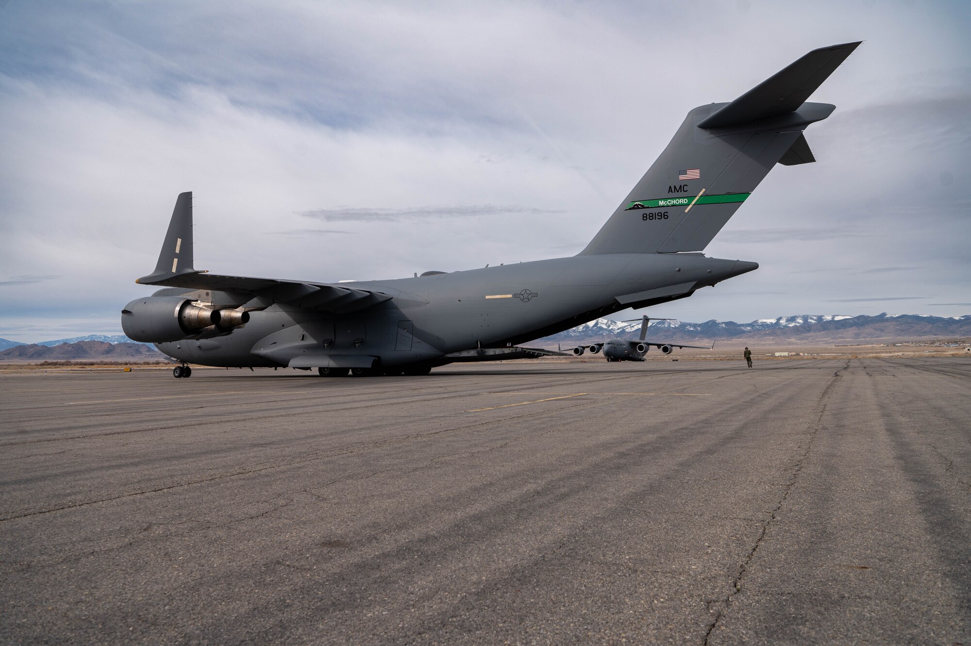 A photo of a C-17 offloading a fuel truck