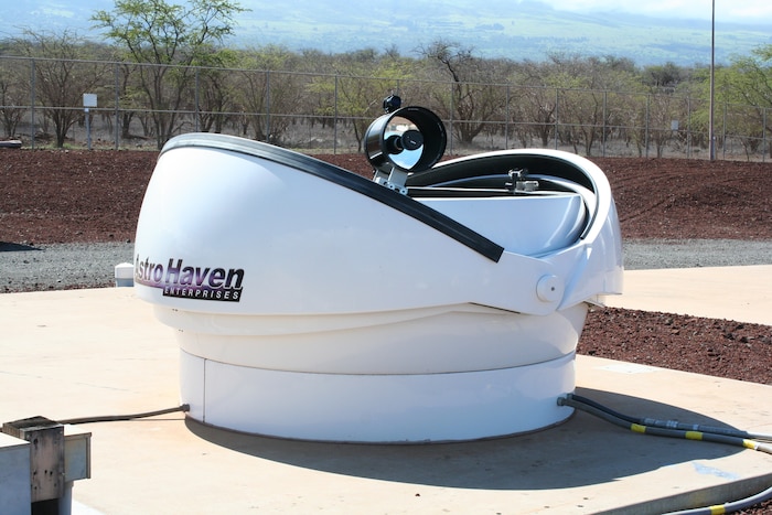 At the Air Force Maui Optical and Supercomputing site located at Kihei, Maui, Hawaii, the 11-inch diameter telescope in its clam-shell dome donated for science, technology, engineering and math outreach. 
From the annual conference, a team of volunteer scientists, some from NASA and some from AFRL, physically lift the dome for transport to the dedicated AFRL site.

(U.S. Air Force photo / James Sowell)