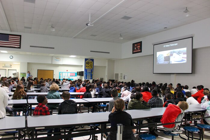 Students at Lanier middle school in Sugar Hill, Georgia, view the Aloha telescope dome in their cafeteria during school hours. The STEM outreach project involving the Air Force Research Laboratory, the Georgia Institute of Technology and the University of Hawaii encourages grade school- to university-level students to learn more about astronomy and explore the different career paths science, technology, engineering and math has to offer.

(Courtesy photo / James Sowell)