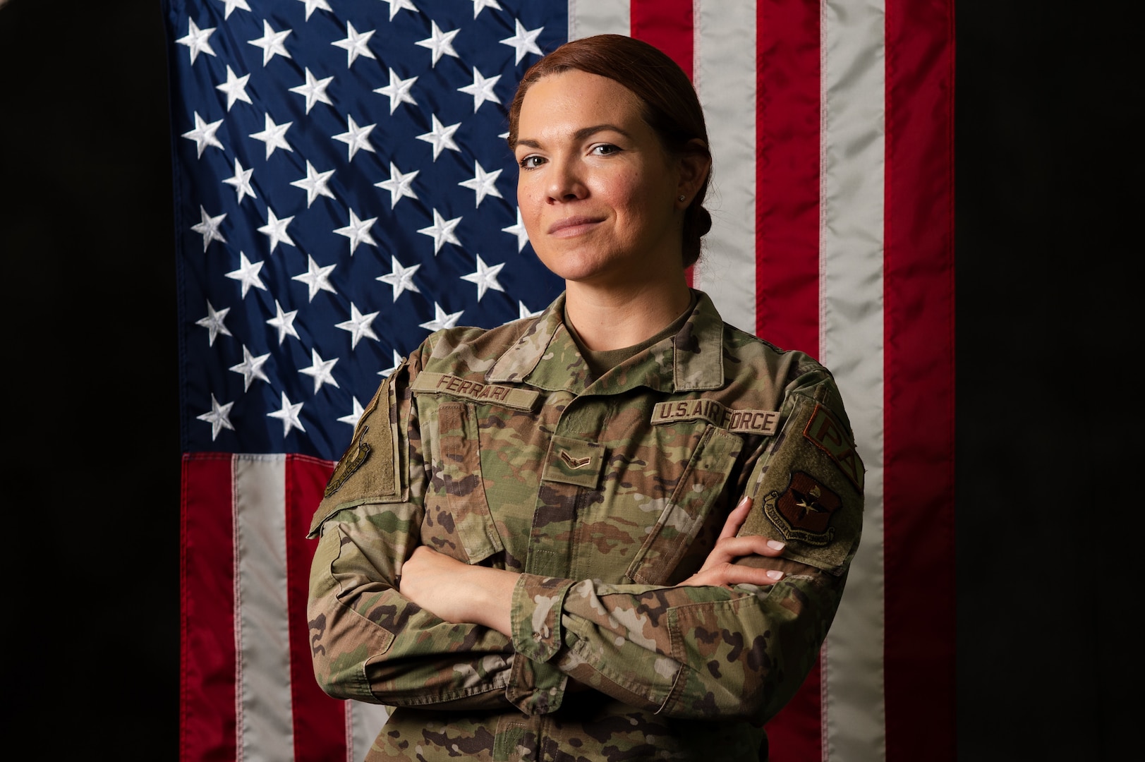 U.S. Air Force Airman 1st Class Michelle Ferrari, 49th Wing Public Affairs journeyman, poses for a photo at Holloman Air Force Base, New Mexico, April 3, 2024. Ferrari shared her experiences that ultimately led to her joining the Air Force, exemplifying resiliency and the ability to overcome hardships and traumatic experiences. (U.S. Air Force photo by Senior Airman Antonio Salfran)