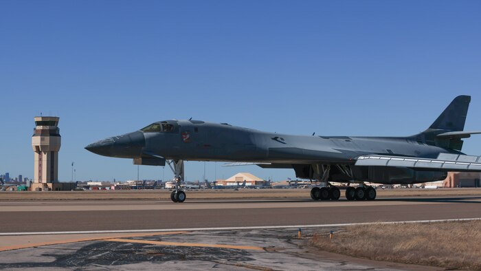 B-1B aircraft rolling down runway