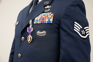 U.S. Air Force tactical air control party element leader with the 22nd Special Tactics Squadron, after receiving a Purple Heart medal at Joint Base Lewis-McChord, Washington, March 26, 2024. The element leader was struck by an explosion initiated by an unmanned aircraft system on March 24, 2023, during the last week of a deployment in an austere location in Syria. He was awarded the medal after suffering from wounds he received that day. (U.S. Air Force photo by Airman 1st Class Kylee Tyus)