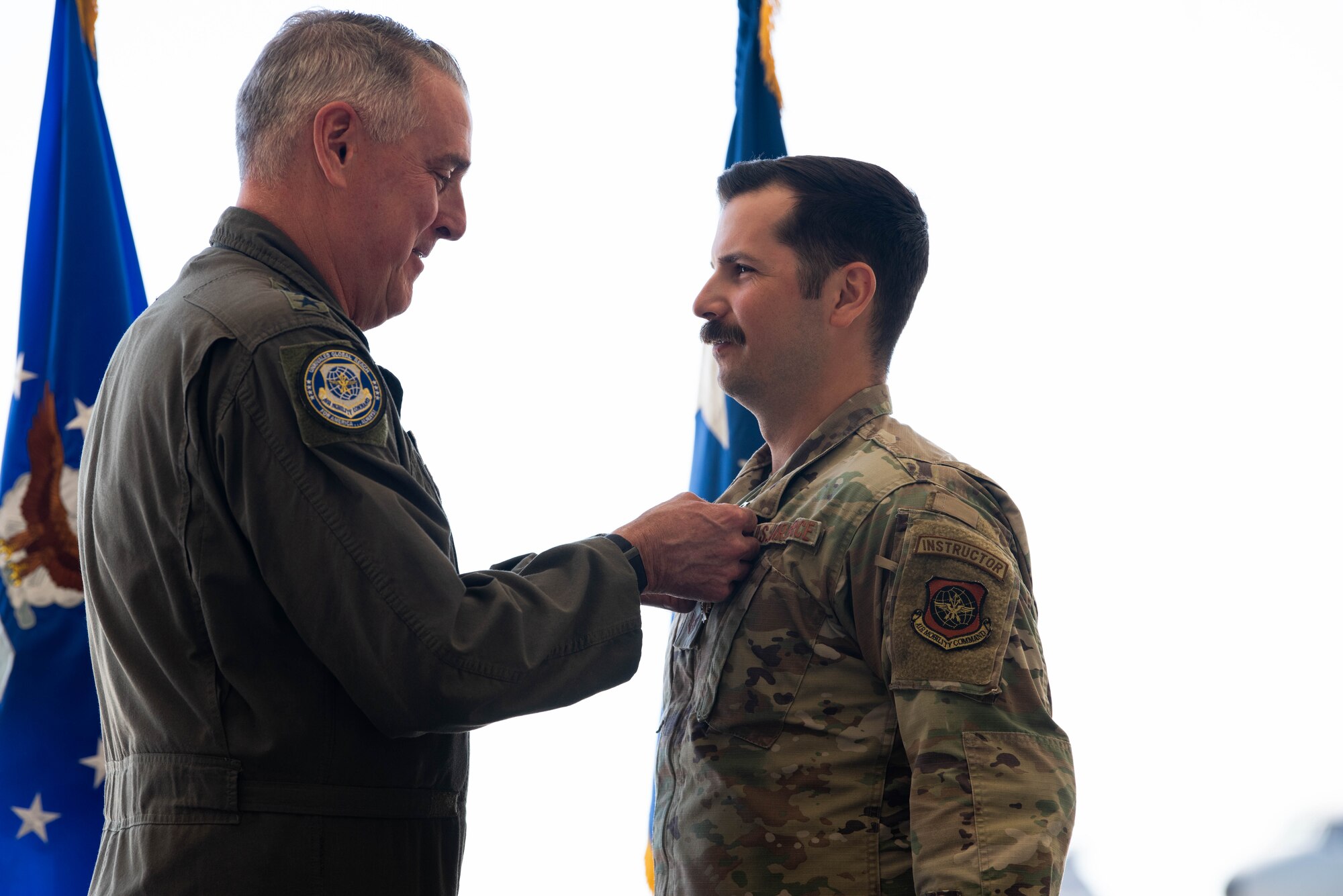 General awards a medal an Airman