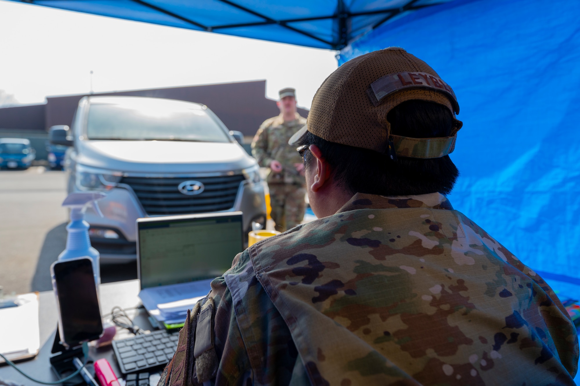 U.S. Air Force Tech. Sgt. Marilou Leybel, 51st Logistics Readiness Squadron fleet management and analysis, assists service members at Osan Air Base, Republic of Korea, April 1, 2024. Units replaced vehicle identification link keys with QR codes to streamline government vehicle refueling processes. (U.S. Air Force photo by Senior Airman Kaitlin Frazier)