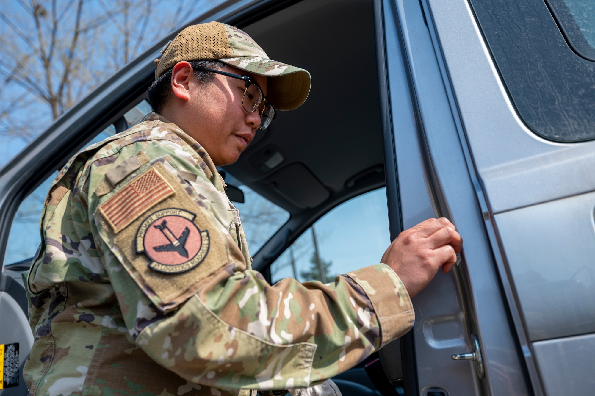 U.S. Air Force Tech. Sgt. Marilou Leybel, 51st Logistics Readiness Squadron fleet management and analysis, places the new refueling QR code at Osan Air Base, Republic of Korea, April 1, 2024. At the end of this initiative, Airmen of the 51st LRS will have serviced 840 vehicles, making the refueling process easier and more efficient for Airmen at Osan. (U.S. Air Force photo by Senior Airman Kaitlin Frazier)