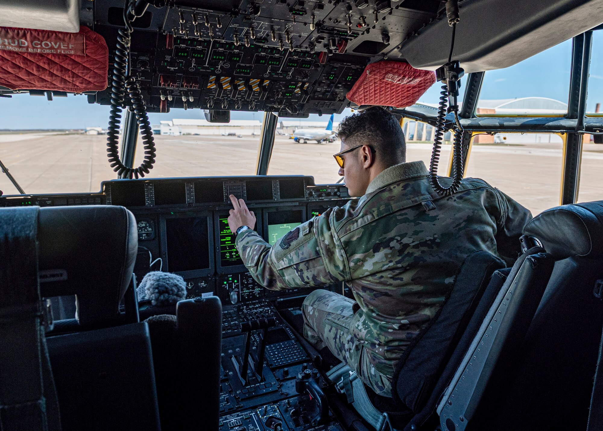U.S. Air Force Airman 1st Class Erick Fuentes, 71st Rescue Squadron loadmaster, prepares an HC-130J Combat King II for the Rescue Rodeo at Salina Regional Airport, Kansas, March 27, 2024. Rescue Airmen competed in multiple events throughout the week-long event to take home the Rescue Rodeo trophy. (U.S. Air Force photo by Airman 1st Class Leonid Soubbotine)
