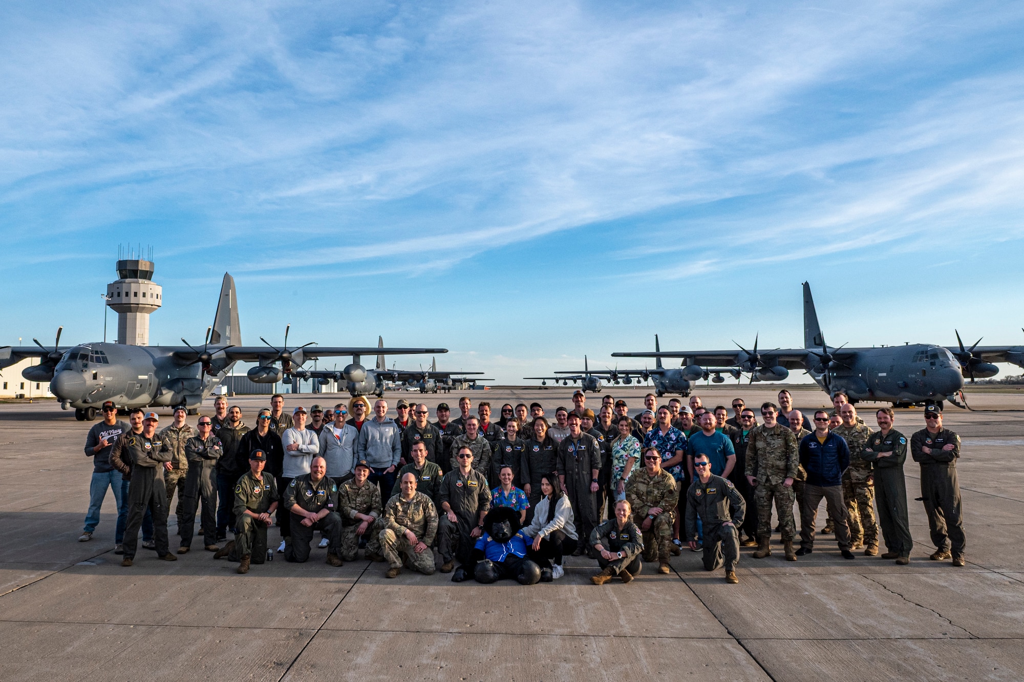 U.S. Air Force Airmen assigned to various rescue squadrons pose for a group photo at Salina Regional Airport, Kansas, March 28, 2024. After several days and multiple training scenarios, the 102nd Rescue Squadron claimed first place in the Rescue Rodeo, an event pitting active duty, Air National Guard, and Reserve rescue units against each other. (U.S. Air Force photo by Airman 1st Class Leonid Soubbotine)