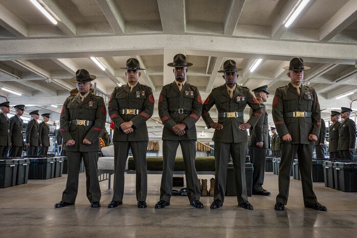 U.S. Marine Corps drill instructors with Hotel Company. 2nd Recruit Training Battalion, pose for a picture after the battalion commander inspection at Marine Corps Recruit Depot San Diego, California, April 3, 2024. The battalion commander’s inspection surveys new Marines knowledge, bearing, and attention to detail and is one of their last tests before graduating. (U.S. Marine Corps photo by Cpl. Sarah M. Grawcock)