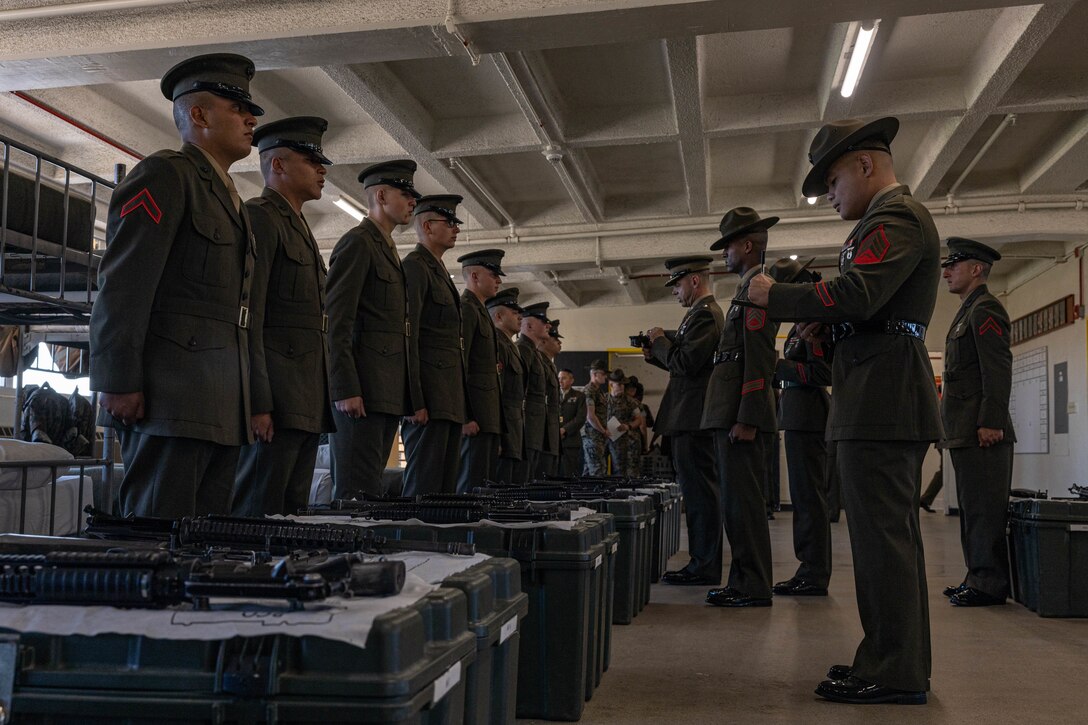 U.S. Marines with Hotel Company, 2nd Recruit Training Battalion, get inspected by drill instructors and staff with 2nd Recruit Training Battalion, during their battalion commander inspection at Marine Corps Recruit Depot San Diego, California, April 3, 2024. The battalion commander’s inspection surveys new Marines knowledge, bearing, and attention to detail and is one of their last tests before graduating. (U.S. Marine Corps photo by Cpl. Sarah M. Grawcock)
