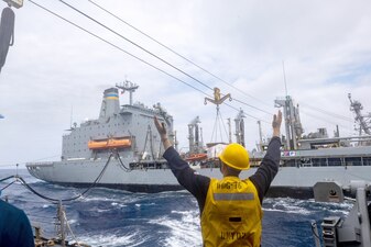 USS Higgins (DDG 76) replenishes from USNS Yukon (T-AO 202) in the Philippine Sea.