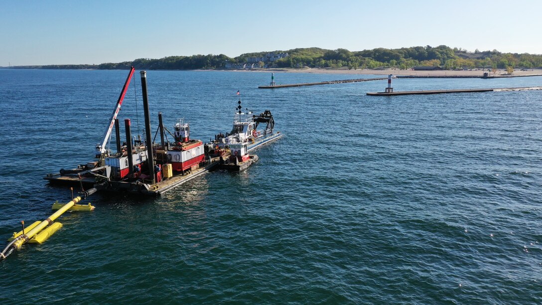 The U.S. Army Corps of Engineers, Detroit District, will begin dredging the outer harbor in Holland, Michigan, this weekend to remove about 31,000 cubic yards of sediment from the federal navigation channel. 
Here dredging is seen during 2022 Holland dredging on May 18, 2022.