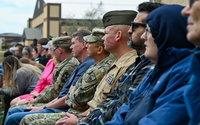 U.S. service members and distinguished guests attend the 2024 National Vietnam War Veteran Memorial and Pinning Ceremony at the Weyandt-Eddy Memorial Plaza, Norma Brown Headquarters building, Goodfellow Air Force Base, Texas, March 29, 2024. The Weyandt-Eddy Memorial Plaza served as a poignant reminder of the heritage and legacy of past and present intelligence missions.