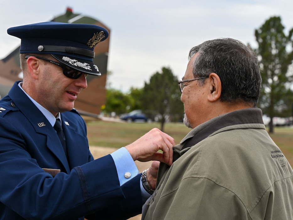U.S. Air Force Col. Christopher Corbett, 17th Training Wing deputy commander, pins Dan Barbero, Vietnam War veteran during the 2024 National Vietnam War Veteran Memorial and Pinning Ceremony at the Weyandt-Eddy Memorial Plaza, Norma Brown Headquarters building, Goodfellow Air Force Base, Texas, March 29, 2024. The Vietnam War Veterans Recognition Act of 2017 was signed into law by 45th U.S. President Donald J. Trump, designating every March 29 as National Vietnam War Veterans Day.