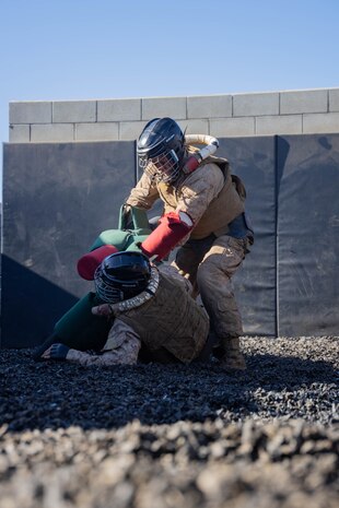 U.S. Marine Corps Recruit Ethan Russel, left, and Rct. Stephen Kays with Alpha Company, 1st Recruit Training Battalion, spar with pugil sticks during the Crucible at Marine Corps Base Camp Pendleton, California, April 2, 2024. The Crucible is a 54-hour exercise where recruits apply the knowledge and training they’ve learned throughout recruit training to earn the title of United States Marine. (U.S. Marine Corps photo by Lance Cpl. Janell B. Alvarez)