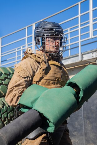 U.S. Marine Corps Recruit Stephen Kays with Alpha Company, 1st Recruit Training Battalion, prepares to spar with pugil sticks during the Crucible at Marine Corps Base Camp Pendleton, California, April 2, 2024. The Crucible is a 54-hour exercise where recruits apply the knowledge and training they’ve learned throughout recruit training to earn the title of United States Marine. (U.S. Marine Corps photo by Lance Cpl. Janell B. Alvarez)