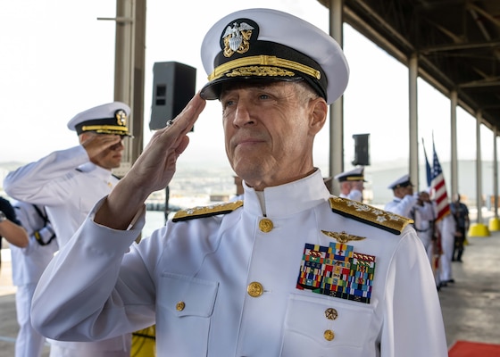 Adm. Stephen Koehler, prospective commander, U.S. Pacific Fleet, salutes sideboys during the COMPACFLT change of command ceremony onboard Joint Base Pearl Harbor-Hickam, April 4, 2024. (U.S. Navy photo by Mass Communication Specialist 2nd Class Christopher Sypert)