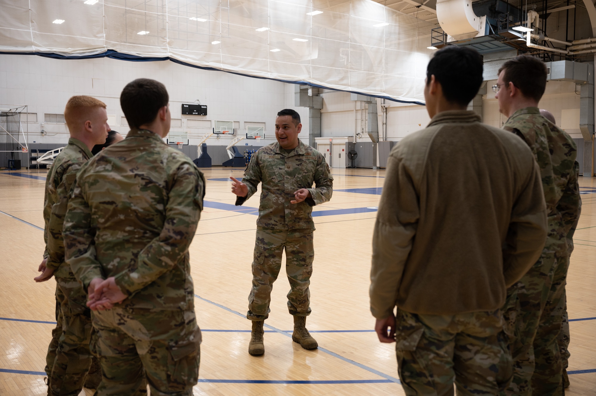 Airmen discuss plans for setup of a beddown exercise.