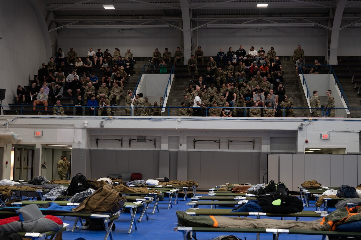 Airmen wait for an initial brief during a beddown exercise at Eielson Air Force Base, Alaska.
