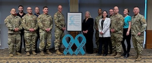 U.S. Army Maj. Gen. John V. Meyer III, the commanding general of the 1st infantry Division and Fort Riley, and Command Sgt. Maj. Clarence B. Raby, the 1st Infantry Division Special Projects Command Sergeant Major, stand with participants of Fort Riley’s SHARP program, March 28, 2024, at Riley’s Community Center. Meyer, Raby and Garber signed the annual SAAPM proclamation. (U.S. Army photo by Lt. Col. Jefferson Grimes)