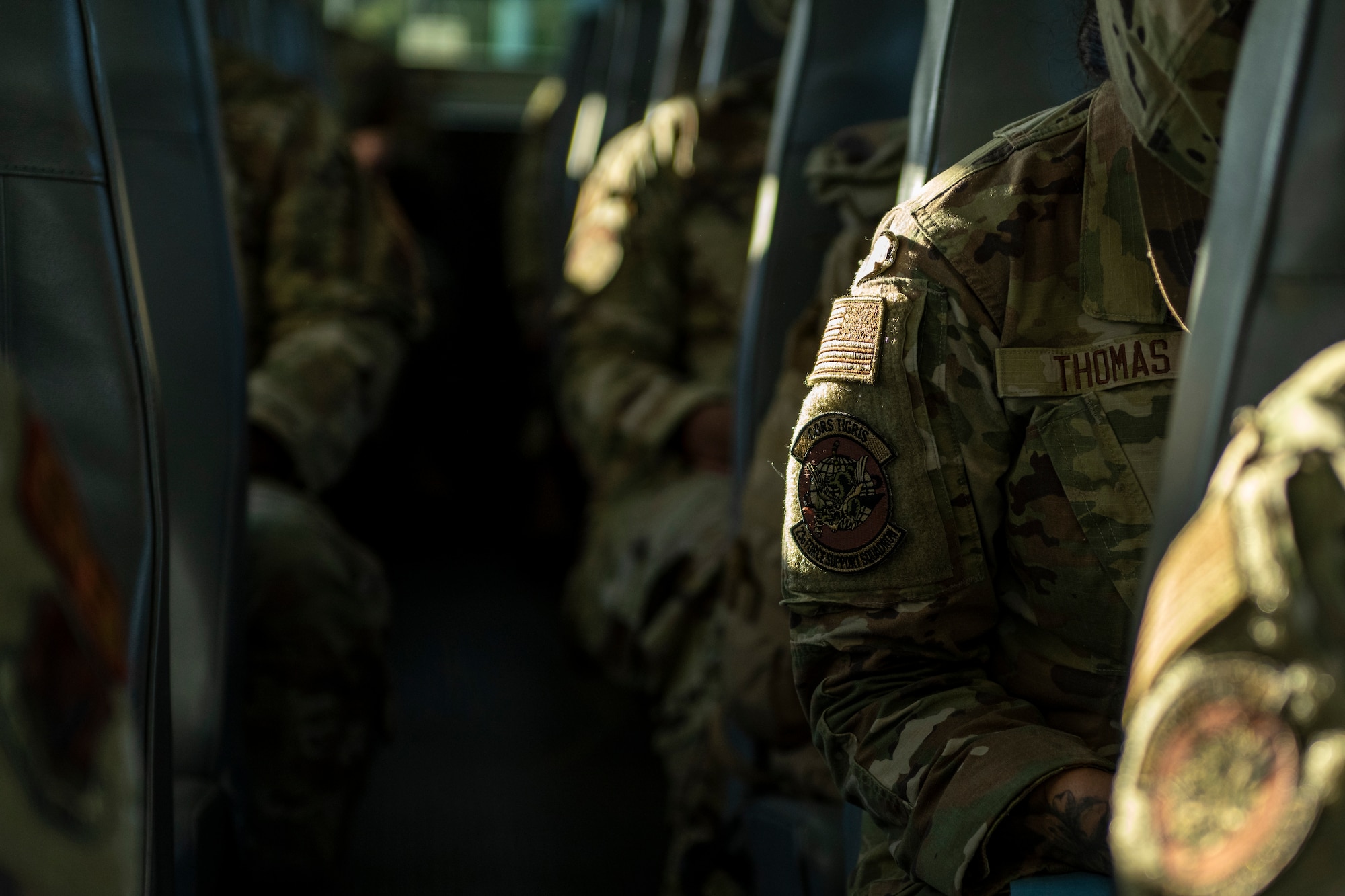 U.S. Air Force Airmen assigned to the 23rd Wing sit on a bus during Exercise Ready Tiger