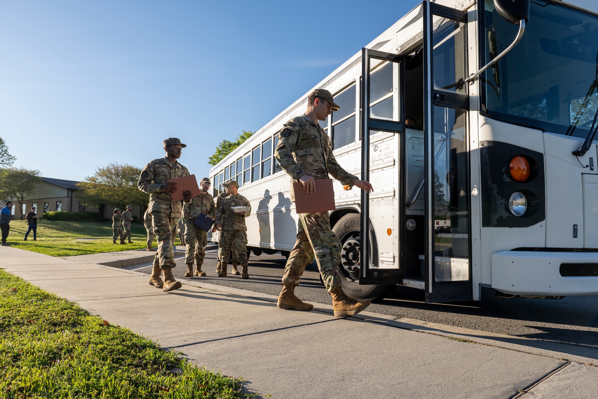 U.S. Air Force Airmen assigned to the 23rd Wing load a bus during Exercise Ready Tiger out processing