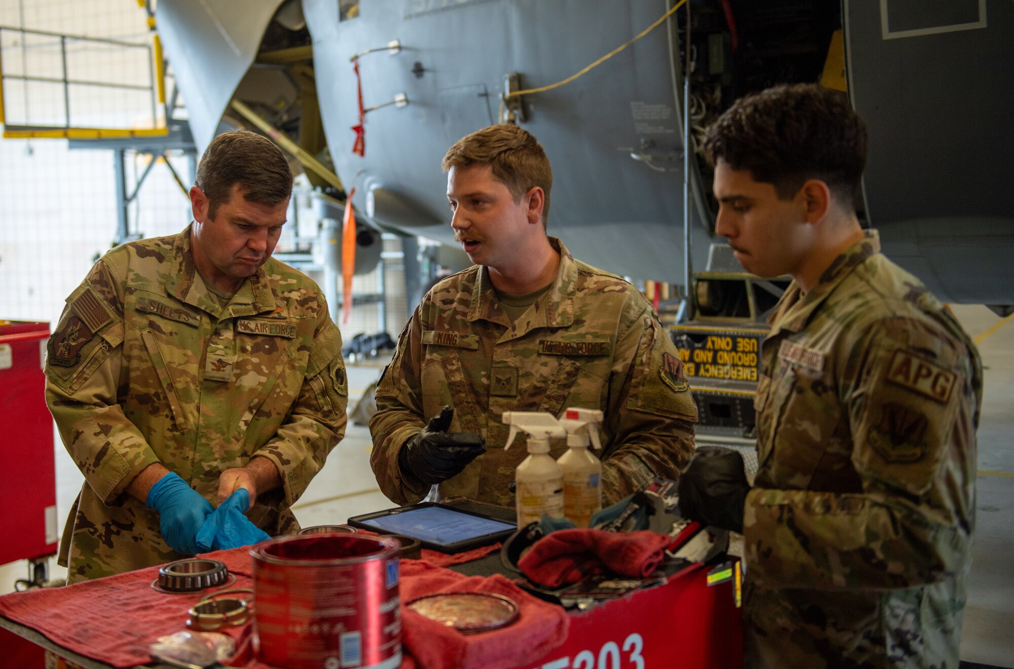 U.S. Air Force Col. Paul Sheets, 23rd Wing commander, prepares to install the front tires of an HC-130J Combat King II at Moody Air Force Base, Georgia, March 25, 2024. Sheets spent time with the 71st RGS, working with them to gain a better understanding of their career field in the Air Force. (U.S. Air Force photo by Airman Cade Ellis)