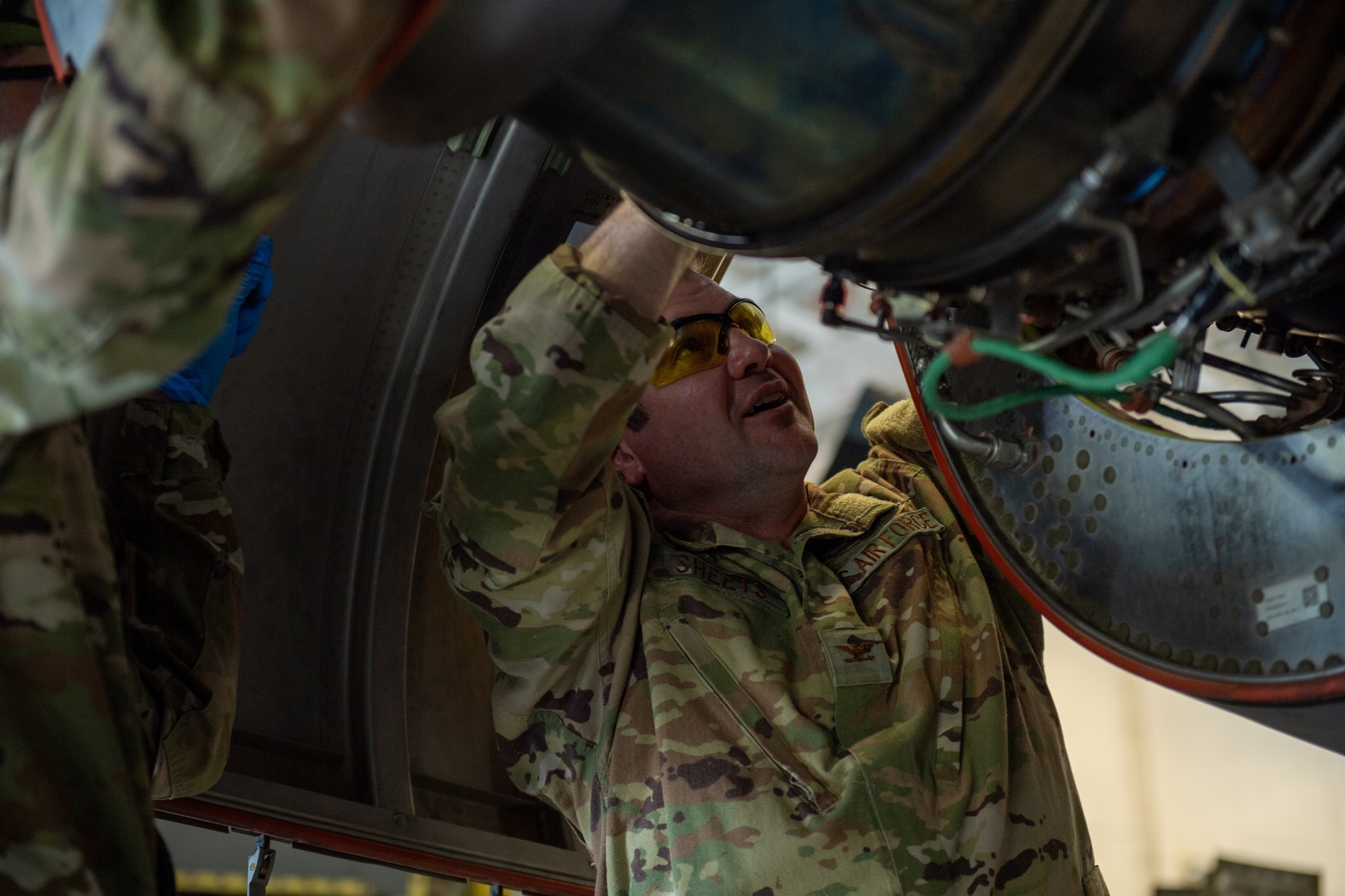 U.S. Air Force Col. Paul Sheets, 23rd Wing commander, works with the 71st Rescue Generation Squadron at Moody Air Force Base, Georgia, March 25, 2024. Sheets spent the afternoon at the 71st RGS HC-130J Combat King II hangar to see how the unit maintains their aircraft to be ready at any moment. (U.S. Air Force photo by Airman Cade Ellis)