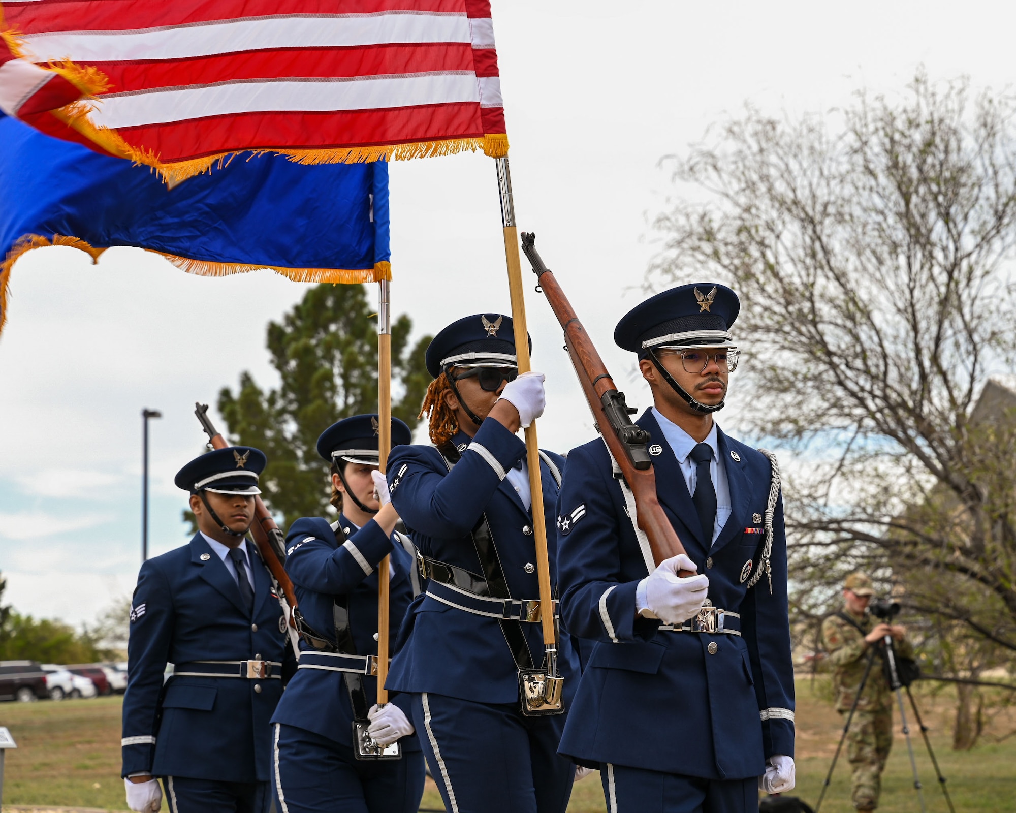 U.S. Air Force Airmen assigned to the 17th Training Wing Base Honor Guard present the colors during the 2024 National Vietnam War Veteran Memorial and Pinning Ceremony at the Weyandt-Eddy Memorial Plaza, Norma Brown Headquarters building, Goodfellow Air Force Base, Texas, March 29, 2024. The Weyandt-Eddy Memorial Plaza served as a poignant reminder of the heritage and legacy of past and present intelligence missions.