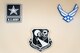3D-printed U.S. Army, 919th SOW, and Air Force emblems hang from a wall