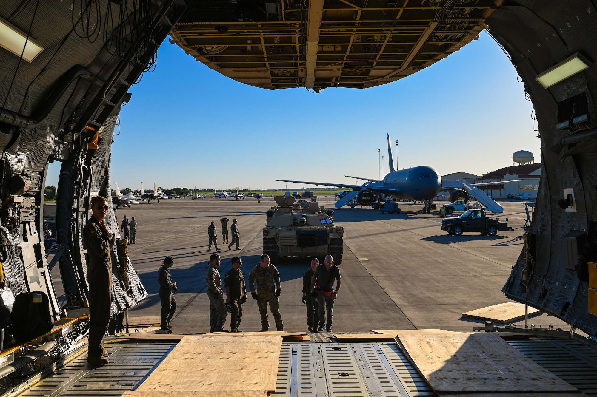 An M1A2 Abrams Main Battle Tank from the U.S. Army’s 2nd Brigade 1st Cavalry Division sits on the tarmac at Joint Base San Antonio-Randolph, Texas after a flying over from Fort Cavazos, Texas aboard a 433rd Airlift Wing C-5M Super Galaxy on April 4th, 2024.