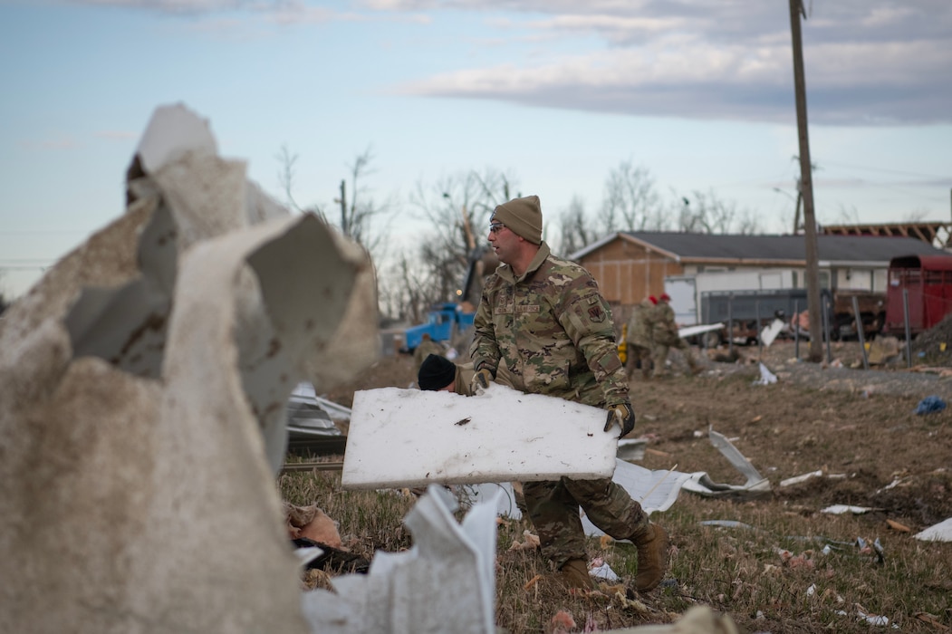 Airmen from the Ohio National Guard’s 200th RED HORSE clear debris from a section of U.S. Route 33 in Logan County, Ohio, March 20, 2024. They were mobilized to assist local authorities and state agencies in the wake of an EF3 tornado that struck the area March 14. (U.S. Air National Guard Photo by Senior Airman Grace Riegel)