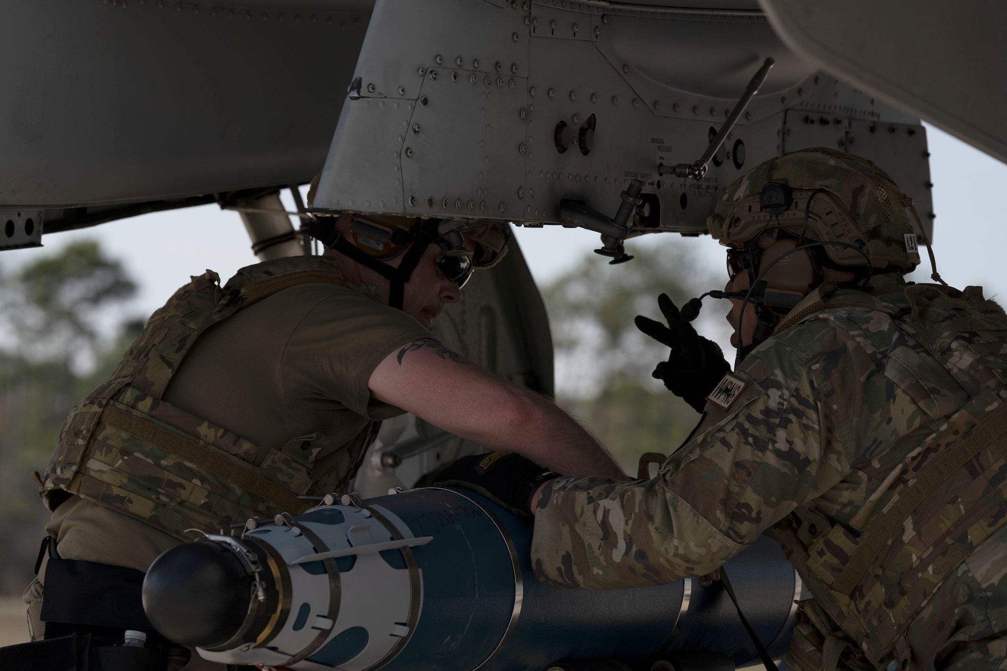 U.S. Airmen assigned to the 127th Wing, Michigan Air National Guard, load practice bombs onto an A-10 Thunderbolt II aircraft during the Agile Rage exercise, Avon Park, Florida, Feb. 27, 2024. Agile Rage 2024 is a National Guard Bureau (NGB)/A3 led military exercise, hosted at the Air Dominance Center, taking place from February 26 to March 8, 2024 that involves the collaborative efforts of various Air National Guard Wings conducting joint counter-land and combat search and rescue (CSAR) operations in a simulated medium to high threat environment. (U.S. Air National Guard photo by Master Sgt. Rafael D. Rosa)