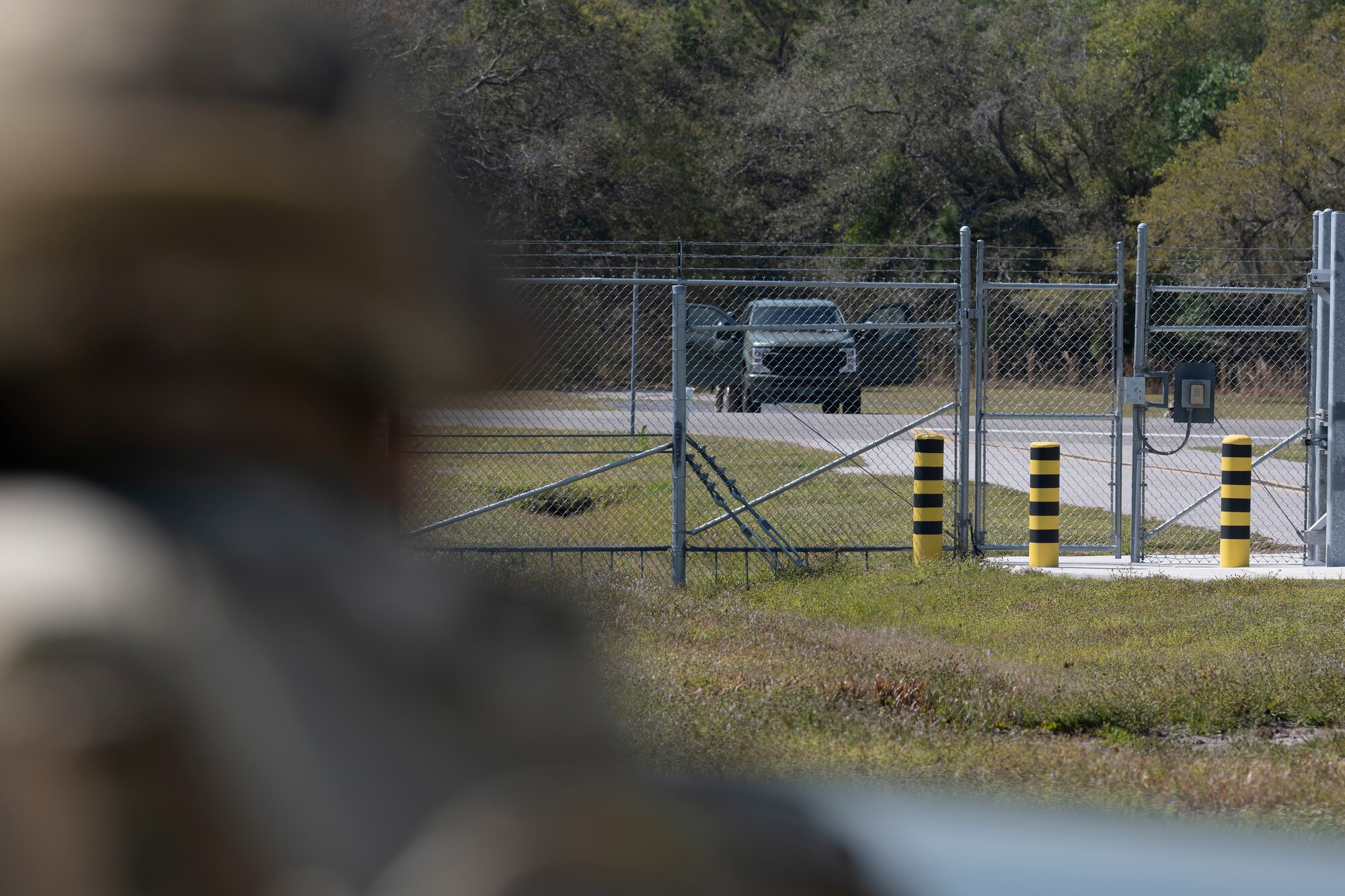 A U.S. Airman with the 156th Contingency Response Group, Puerto Rico Air National Guard, aims at opposing forces in support of agile combat employment operations during the Agile Rage exercise, Avon Park, Florida, Feb. 28, 2024. Agile Rage 2024 is a National Guard Bureau (NGB)/A3 led military exercise, hosted at the Air Dominance Center, taking place from February 26 to March 8, 2024 that involves the collaborative efforts of various Air National Guard Wings conducting joint counter-land and combat search and rescue (CSAR) operations in a simulated medium to high threat environment. (U.S. Air National Guard photo by Master Sgt. Rafael D. Rosa)