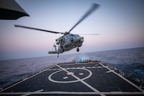 231012-N-GF955-1650 EASTERN MEDITERRANEAN SEA (Oct. 12, 2023) An MH-60S Sea Hawk helicopter assigned to the “Tridents” of Helicopter Sea Combat Squadron (HSC) 9 lands on the flight deck of the Arleigh Burke-class guided-missile destroyer USS Carney (DDG 64), October 12, 2023. Carney is currently a part of the Gerald R. Ford Carrier Strike Group. The strike group is on a scheduled deployment in the U.S. Naval Forces Europe area of operations, employed by the U.S. Sixth Fleet to defend U.S., allied, and partner interests. (U.S. Navy photo by Mass Communication Specialist 2nd Class Aaron Lau)