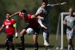 Marine Capt. Mats Bjurman MCB Camp Pendleton, Calif. and Air Force 1st Lt. Michael Neacsu of Hanscom AFB, Mass. battle for the ball during the first match of the 2024 Armed Forces Men's Soccer Championship hosted by Marine Corps Logistics Base Albany, Georgia at Albany State University from April 2-10. The Armed Forces Championship features teams from the Army, Marine Corps, Navy (with Coast Guard players), and Air Force (with Space Force players). (DoD photo by EJ Hersom)