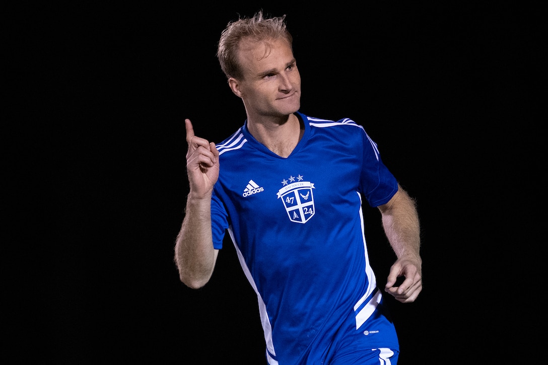 Air Force Capt. Tucker Bone of Vance, AFB, Okla. scores the winning penalty kick to defeat Navy during match four of the 2024 Armed Forces Men's Soccer Championship hosted by Marine Corps Logistics Base Albany, Georgia at Albany State University from April 2-10. The Armed Forces Championship features teams from the Army, Marine Corps, Navy (with Coast Guard players), and Air Force (with Space Force players). (DoD photo by EJ Hersom)